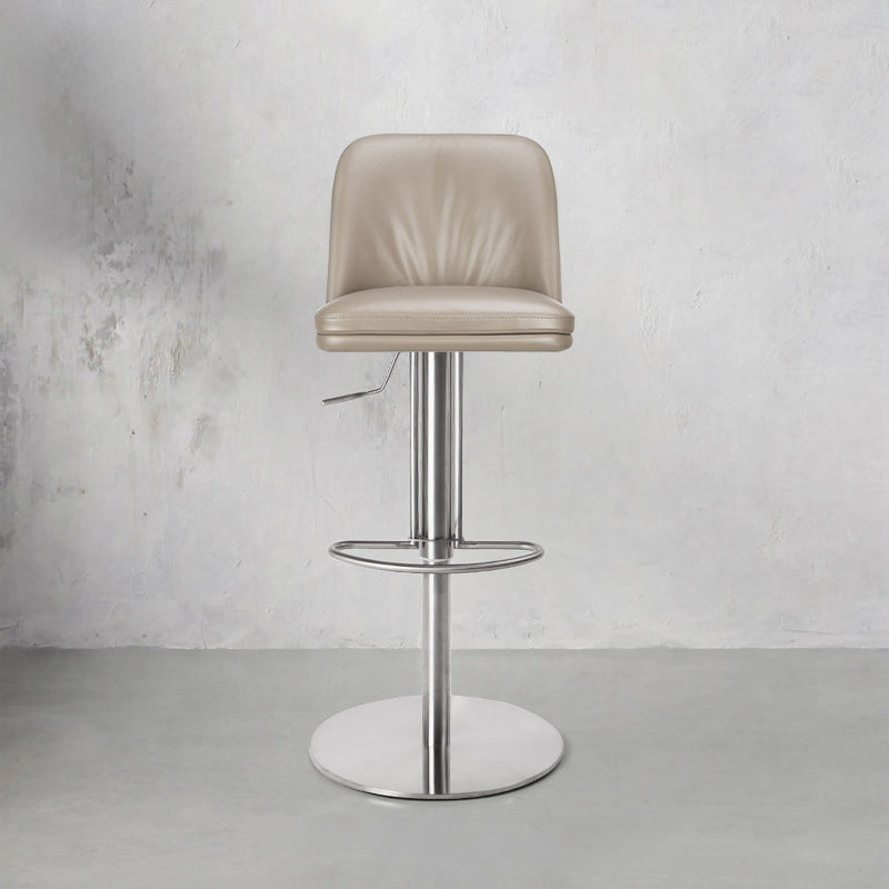 Plain-grain cowhide bar chair HD-7129 by Heduedmobel, featuring a sleek design and rich texture.
