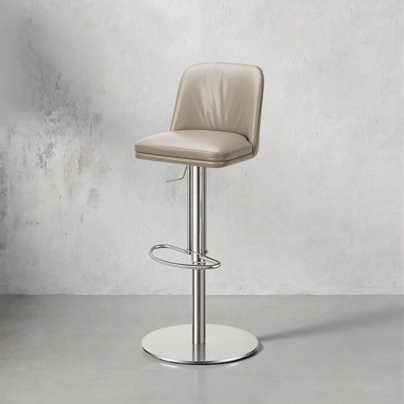Plain-grain cowhide bar chair HD-7129 by Heduedmobel with a sleek design and comfortable seating.
