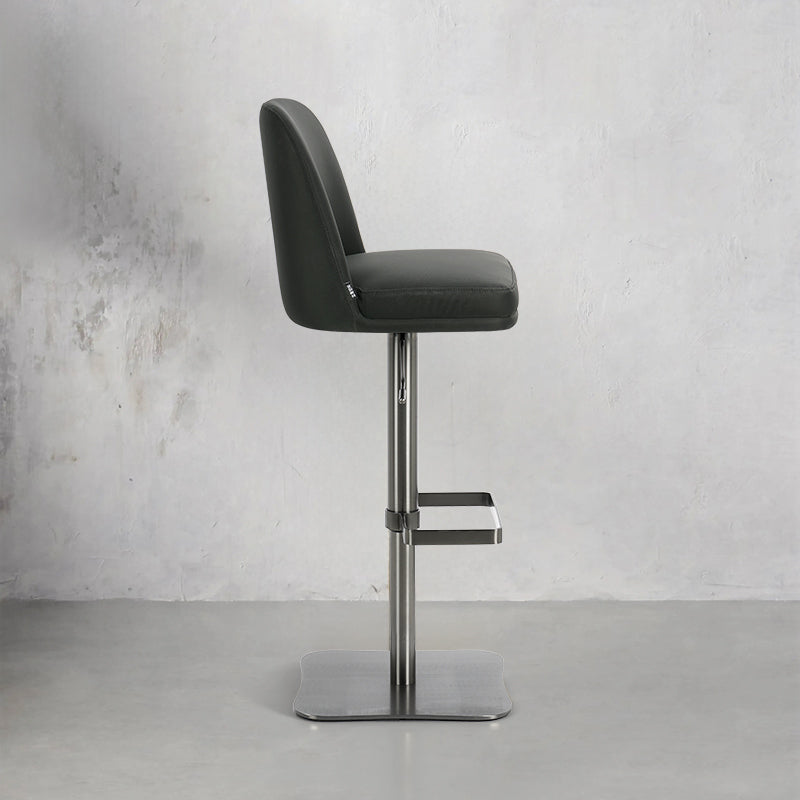 Heduedmobel HD-7508 Meimei PU leather bar chair with a sleek design and cushioned seat, shown in a modern bar setting