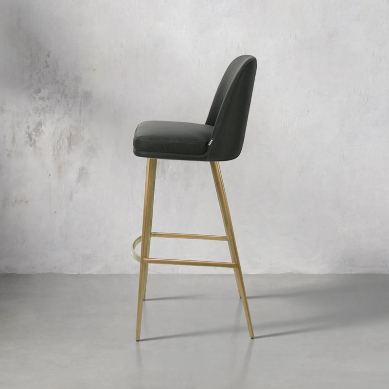 Heduedmobel Meimei PU leather bar chair with sleek design and metallic legs, shown from a side angle.