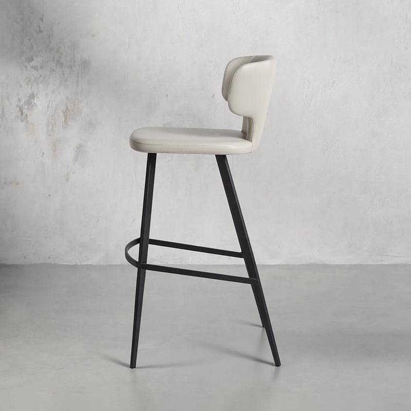 Heduedmobel HD-7136 bar chair with PU leather and plain-grain cowhide upholstery, featuring a modern design and sturdy metal legs.