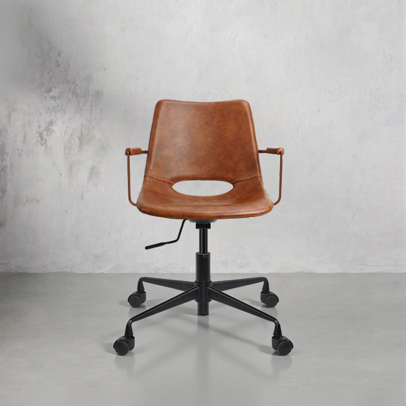 Crazy Horse PU Leather chair by Heduen Möbel showcasing rich texture and modern design in a stylish living space.